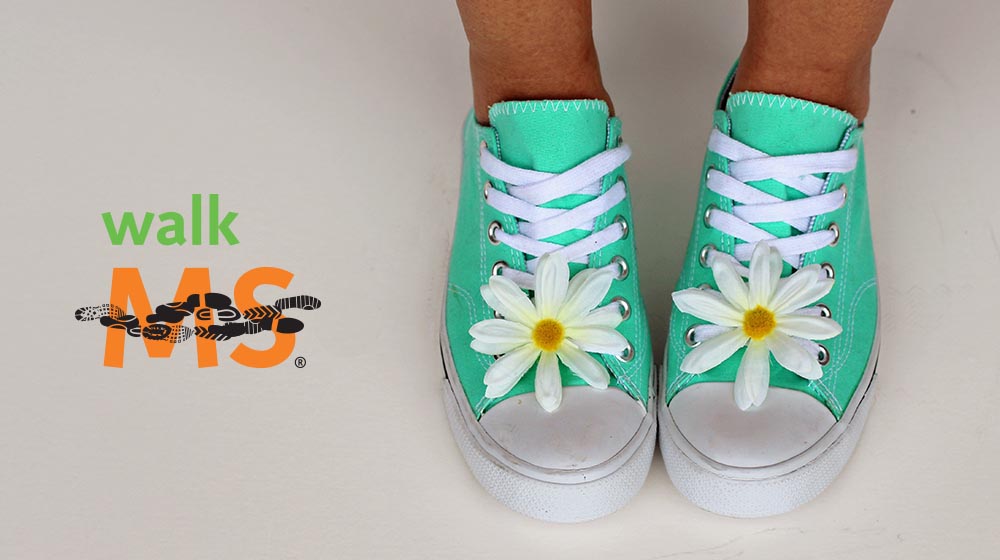 WalkMS logo and green sneakers with flowers