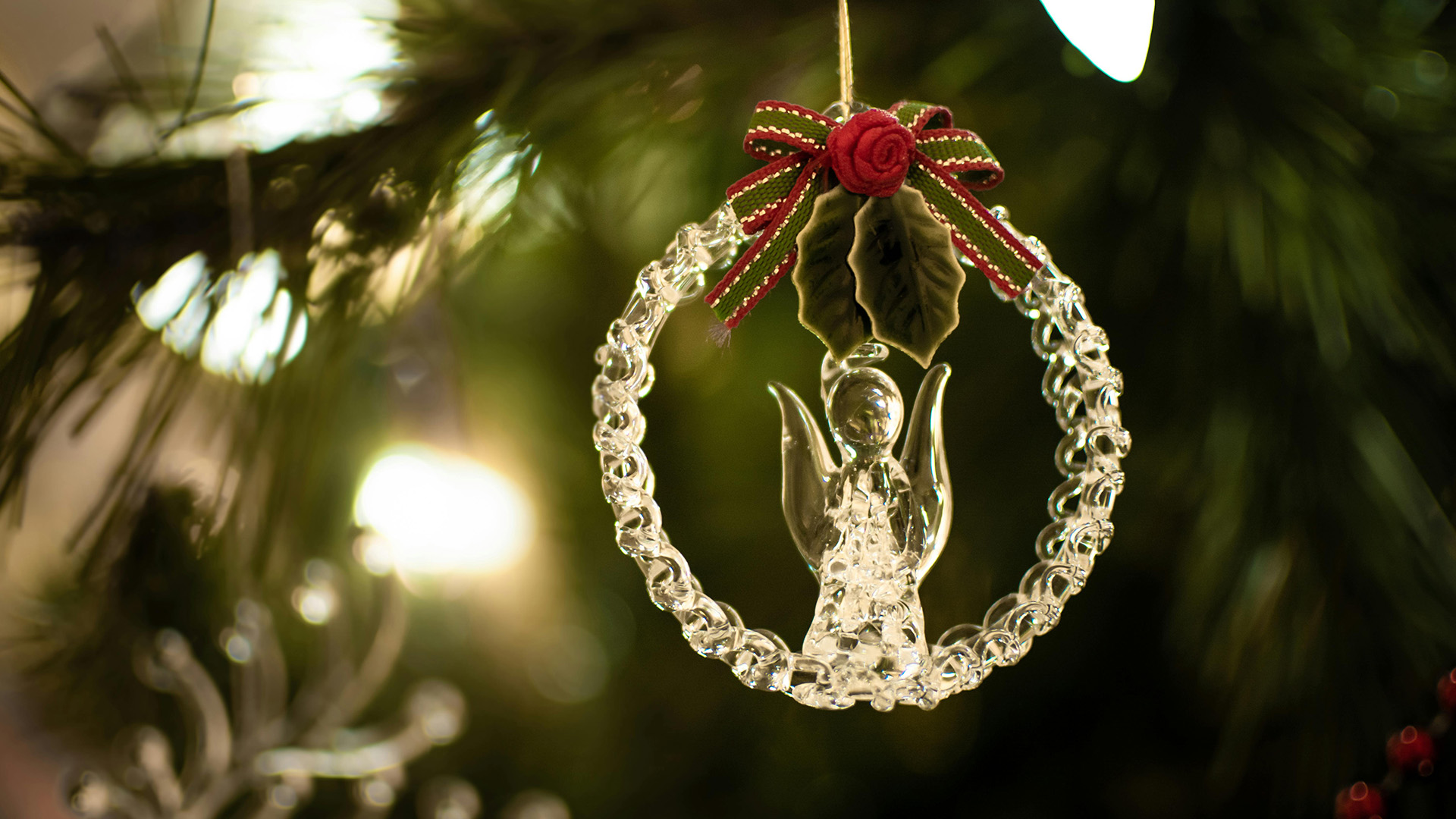 crystal angel holiday ornament on a tree