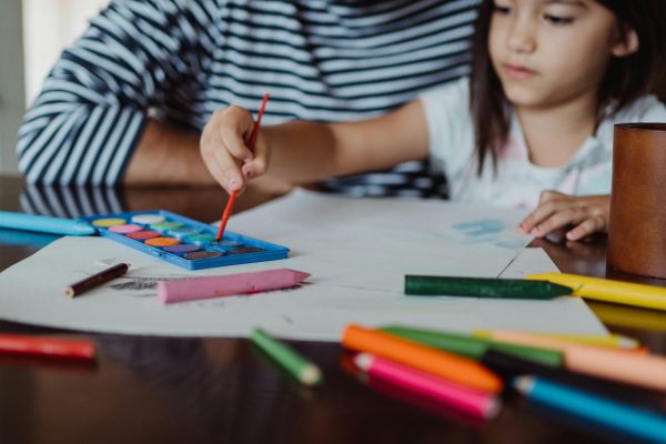 child painting with watercolors